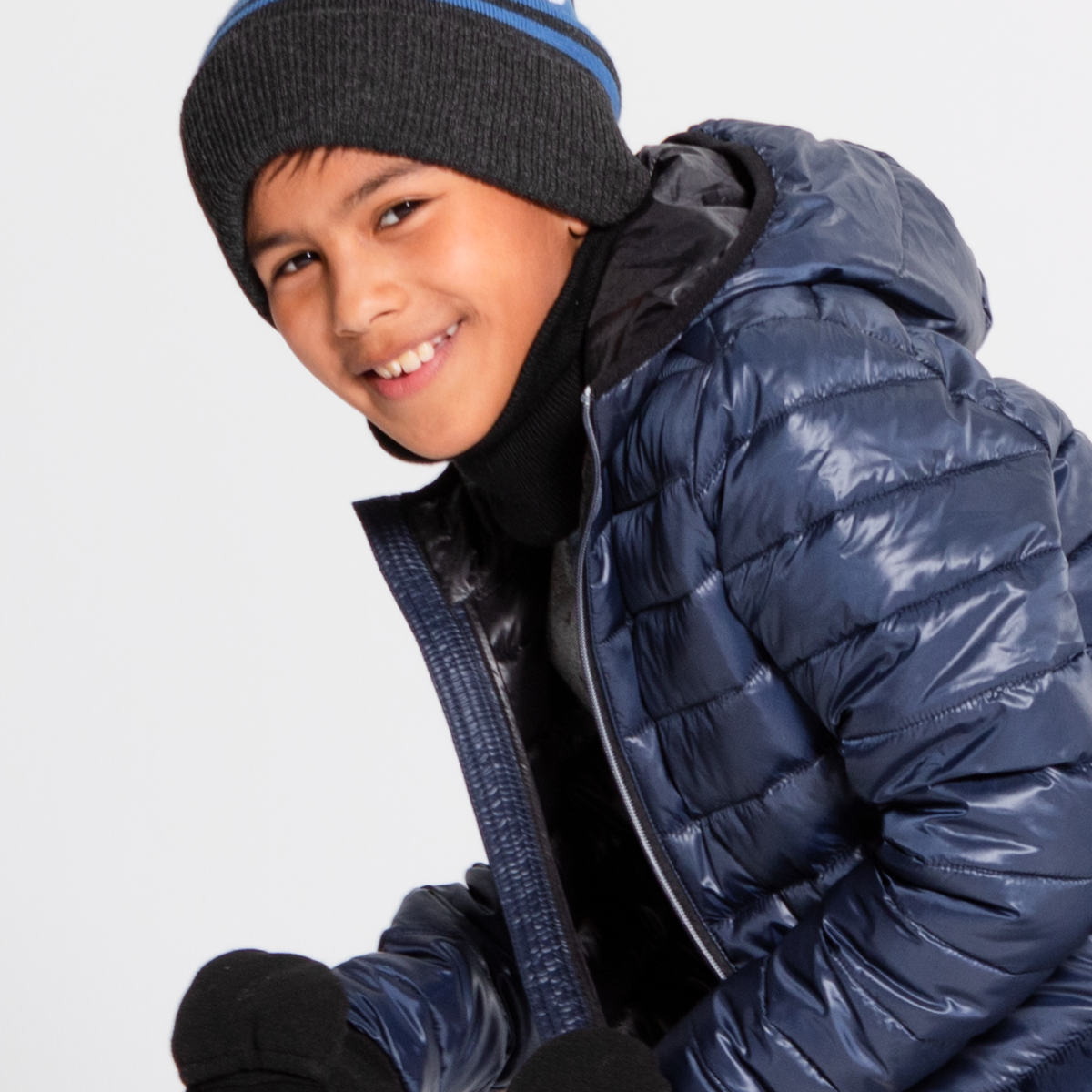 boy wearing hot paws canada flip mitt fleece gloves