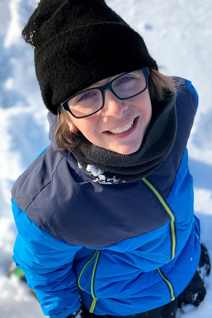 Young boy wearing Hot Paws classic fold-up brim boy's beanie