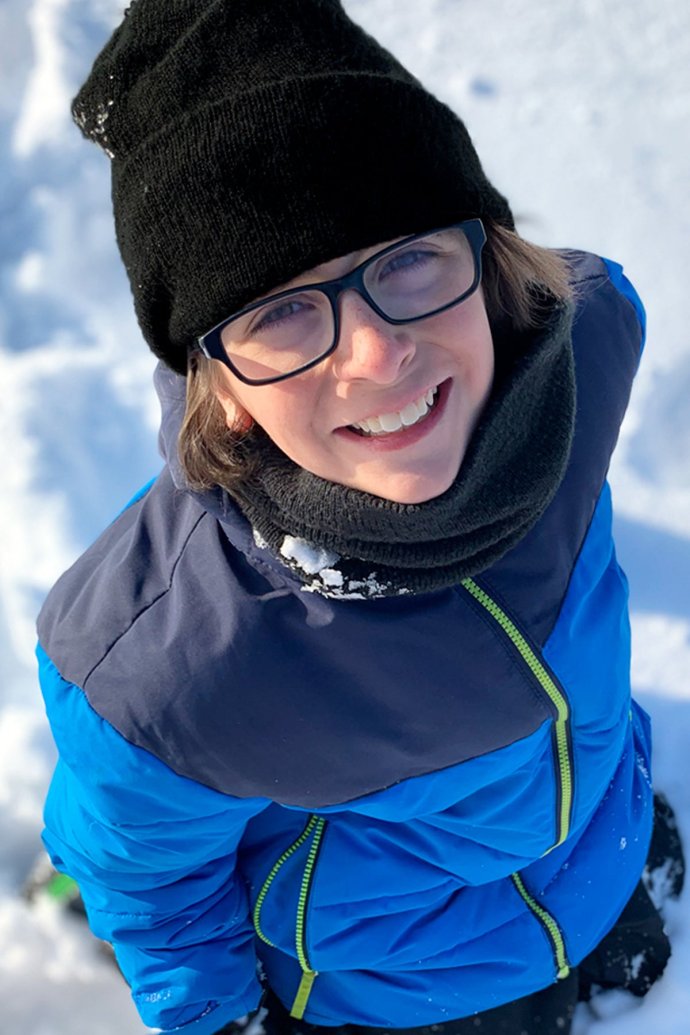 Young boy wearing Hot Paws classic fold-up brim boy's beanie